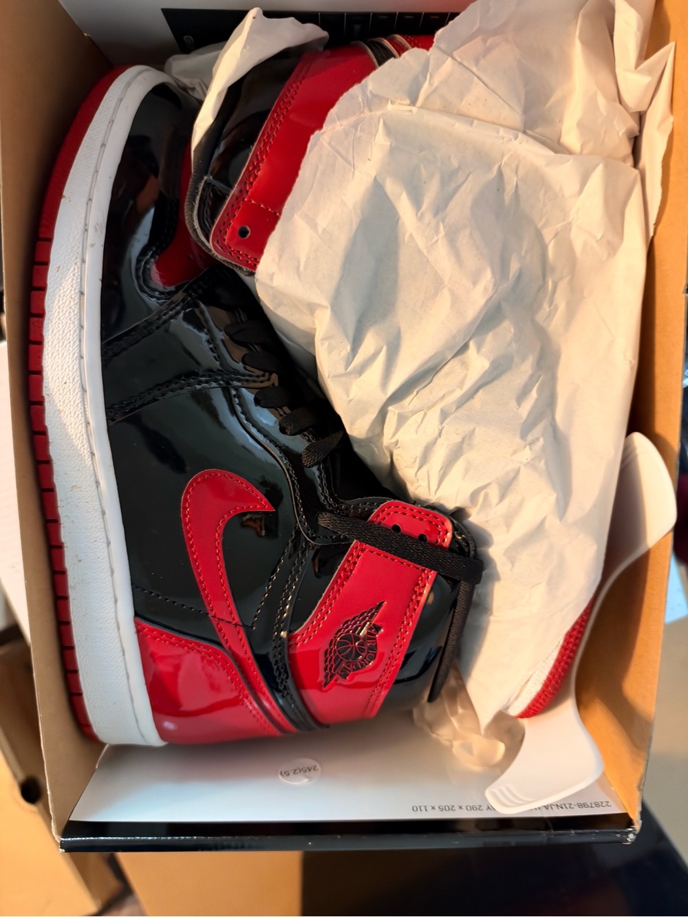 Jordan Patent Leather High-Top Sneakers in Black and Red